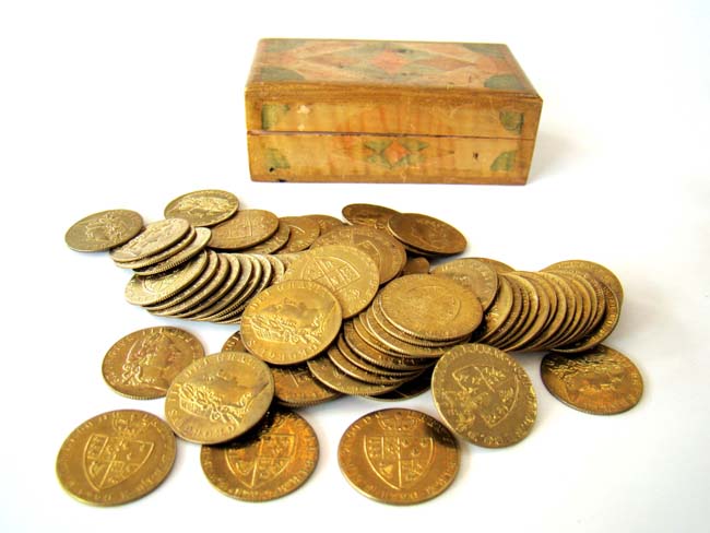 A boxed collection of 78 George III brass Gambling tokens dated 1790 with their original sycamore box.
